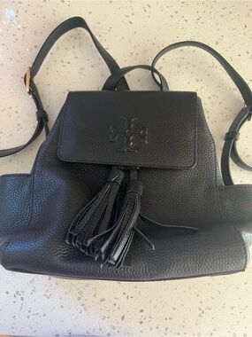 Tory Burch Black Pebbled Leather Tassel Backpack thea mini